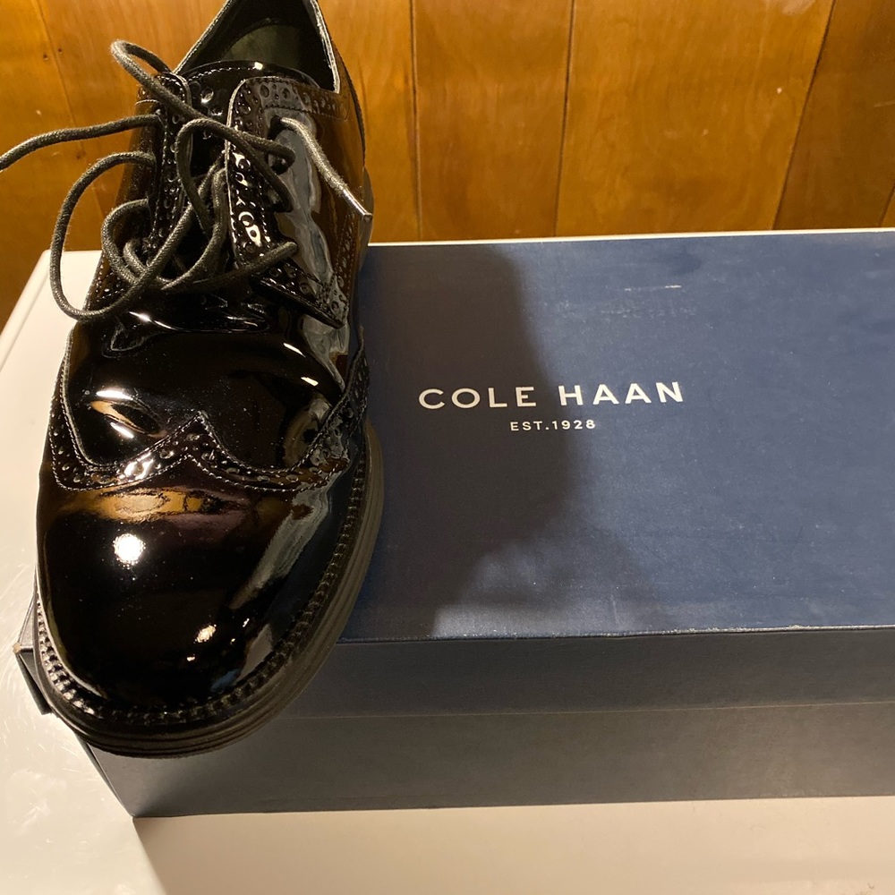 Black patent leather Wingtip shoes